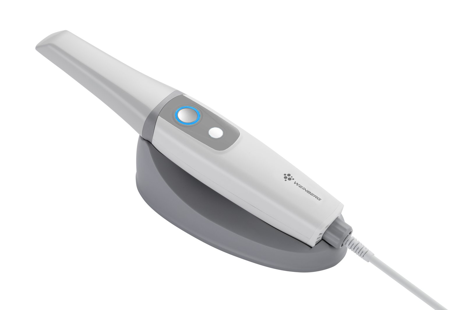 Handheld 3D intraoral scanner resting in its cradle